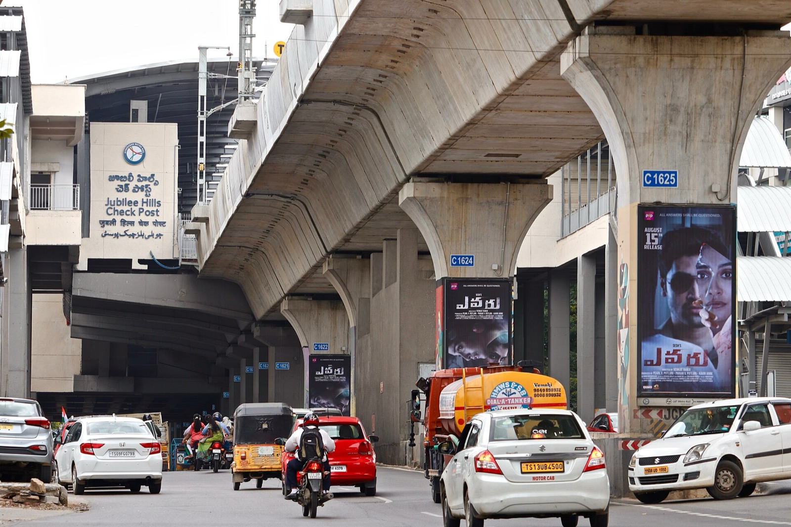 The Jubilee Hills Check Post station name board, seen from the road below